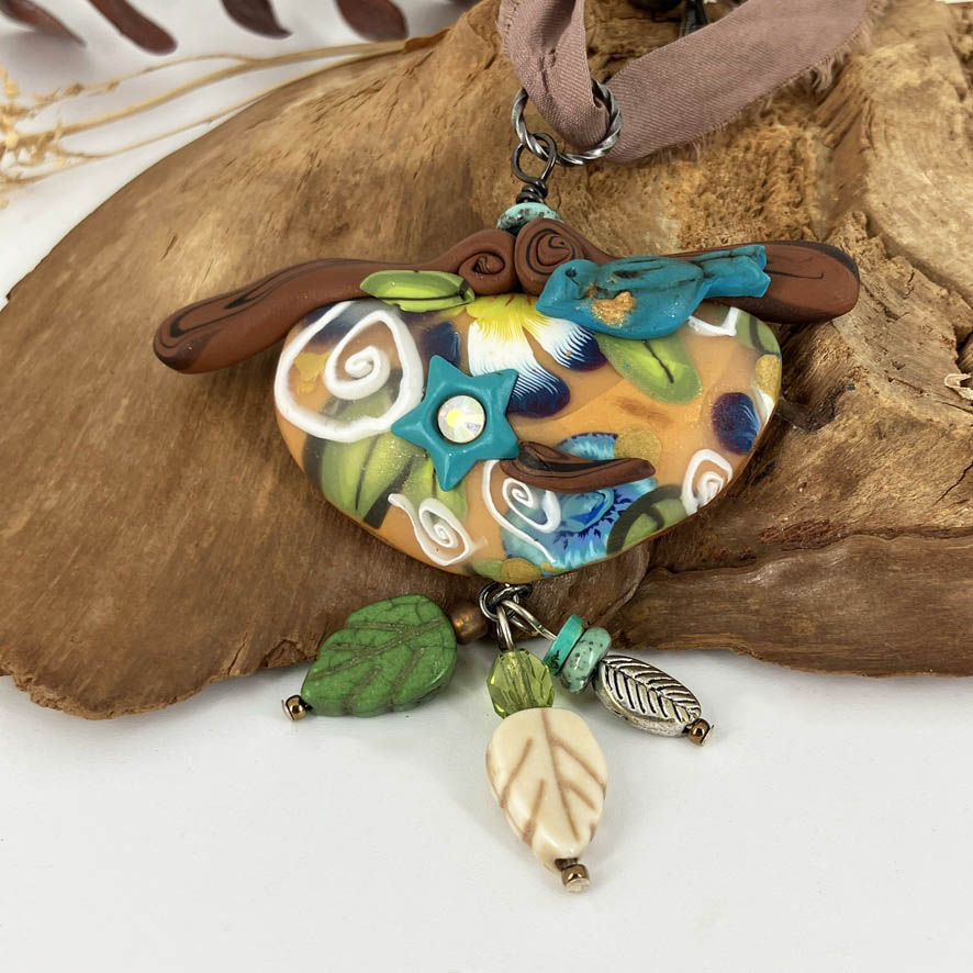 My Birdie Necklace on beaded silk cord