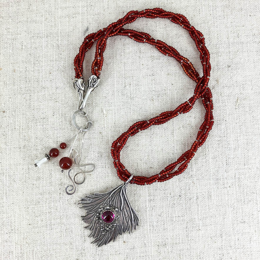 Ruby And Carnelian Wave Necklace And Earrings Set, Handmade By Linda Stiles Smith Of NatureScapes Studio. Red Round Ruby Set in a .999 Fine Silver Wave Pendant. Front View Of The Necklace. Unique gift for women who love nature.