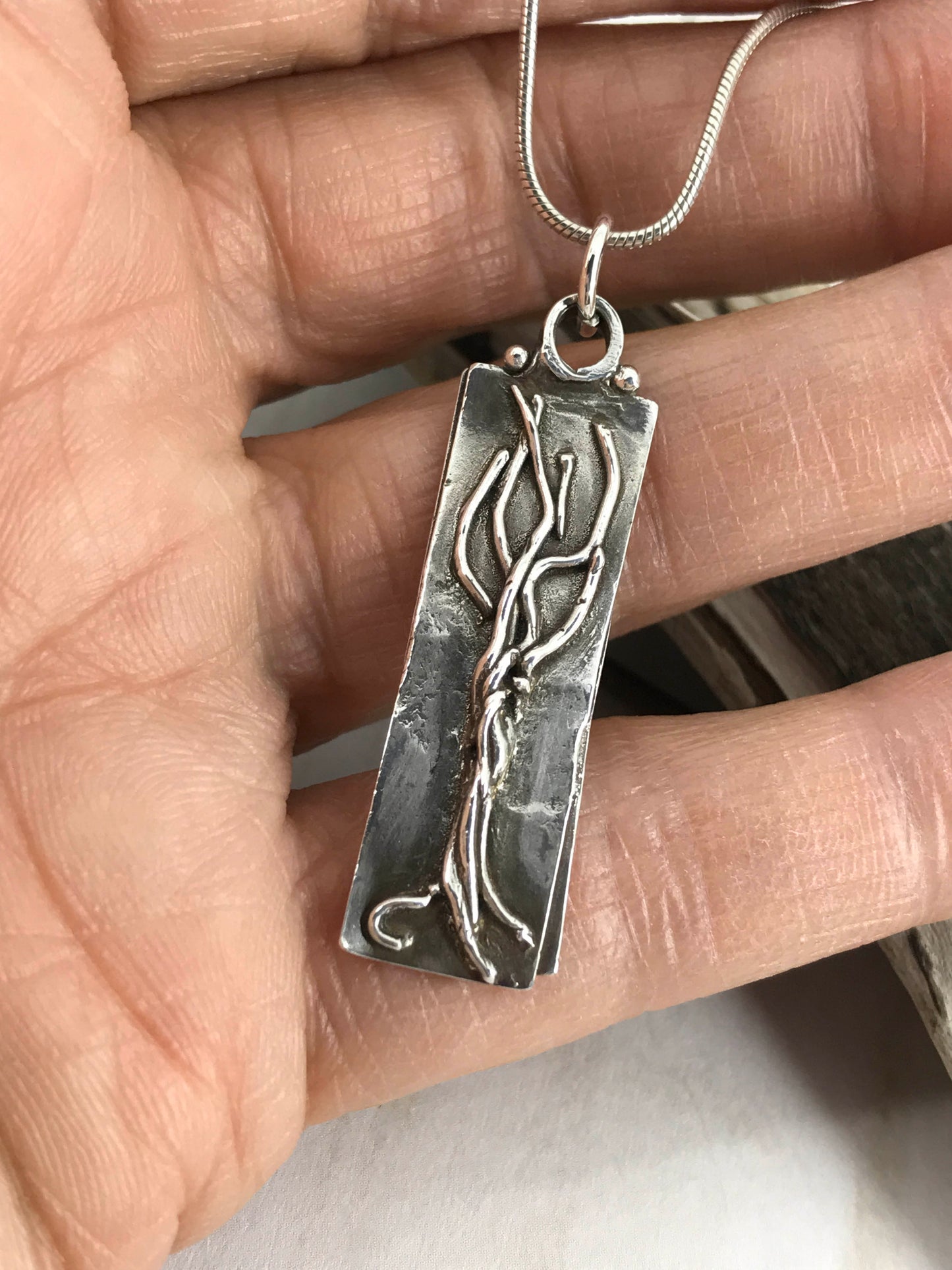 Take Root Pendant. A Unique .999 Fine Silver Message from the “Trees Speak” Series. Handmade By Linda Stiles Smith Of NatureScapes Studio. Unique Gift For Women Who Love Nature. Christian Gift Idea. Front View.