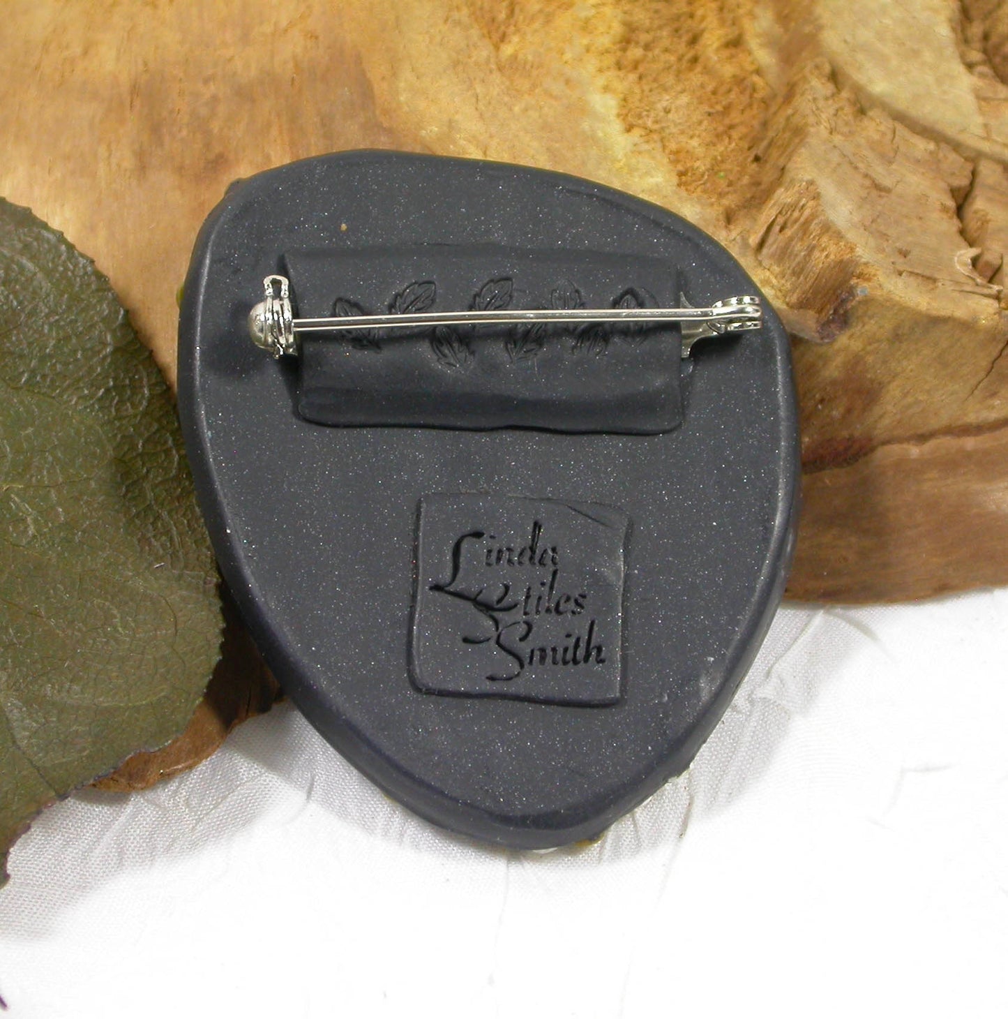 One-of-a-Kind Ocean Jasper Gemstone Brooch Handmade by Linda Stiles Smith of NatureScapes Studio. Gorgeous Ocean Green Colors, Gold Tone with White Dots and lightly sparkling Black Polymer Clay. Gift Ideas For Women. Gifts For Teachers. Wearable Art. Back View.