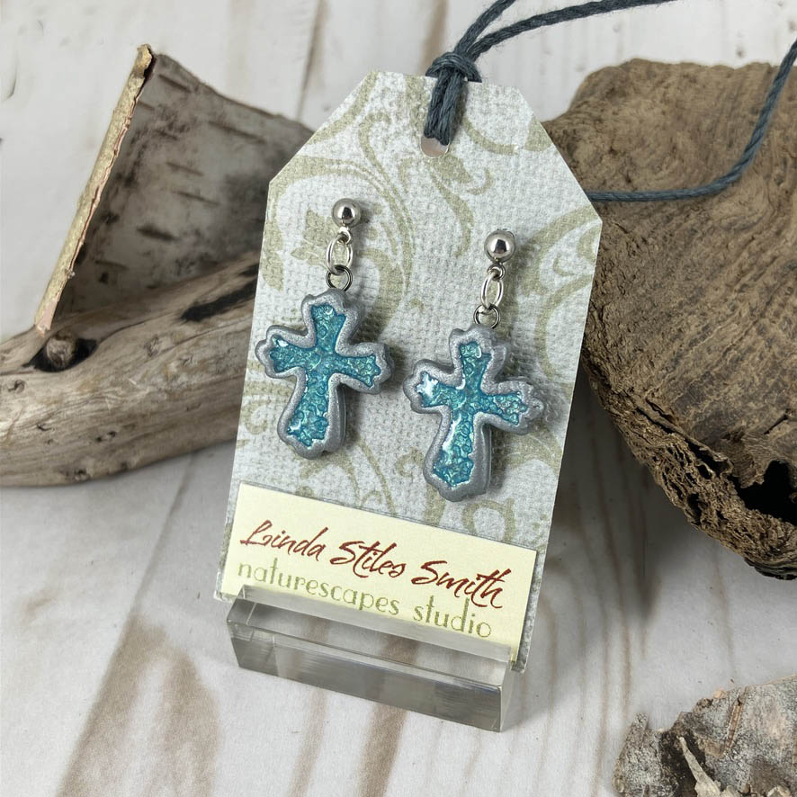Inner Glow Cross Earrings Warm Hues Collection Handmade with polymer clay by Linda Stiles Smith of NatureScapes Studio. Front view of the color Turquoise. Gift ideas for Christian Women.