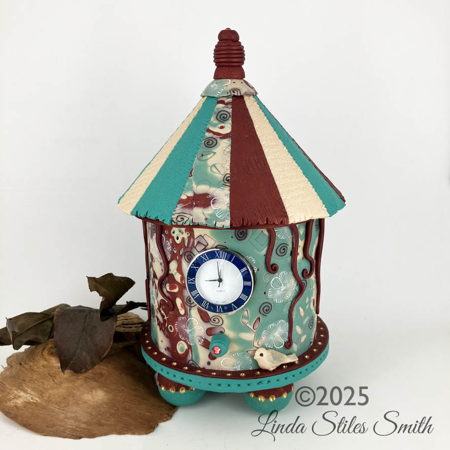 Turquoise and ivory and red carousel clock is a one of a kind design by Linda Stiles Smith of NatureScapes Studio.
