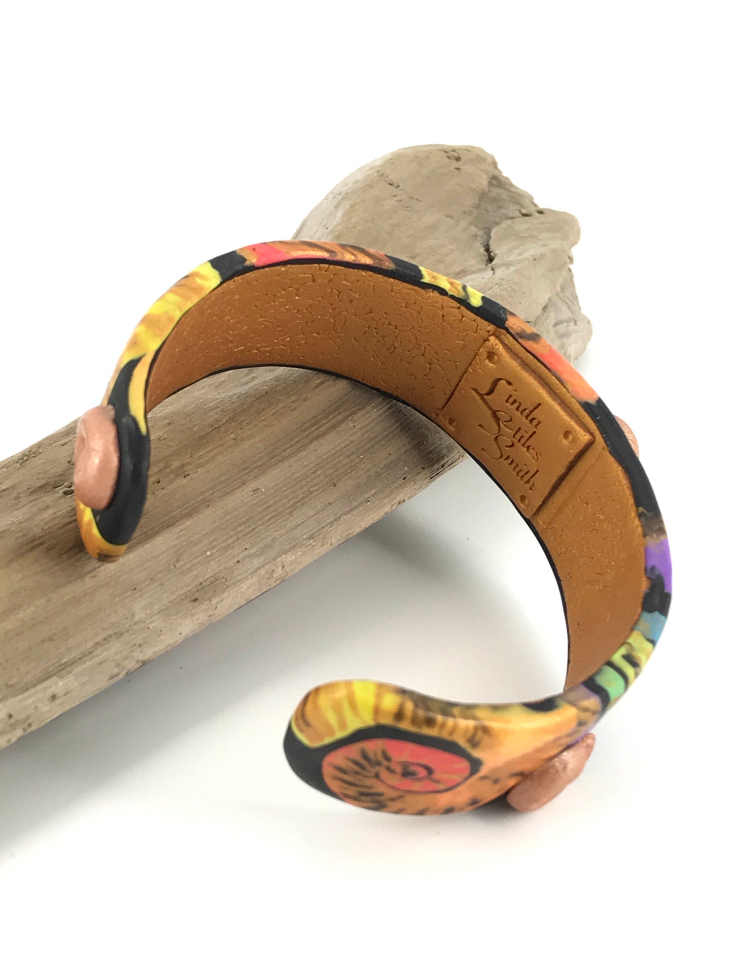 Color Symphony Cuff Bracelet – A One-of-a-Kind Masterpiece Handmade Using Polymer Clay By Linda Stiles Smith Of NatureScapes Studio. Unique Gifts For Women. View Of The Underside Showing Stamp Signature Of Artist.