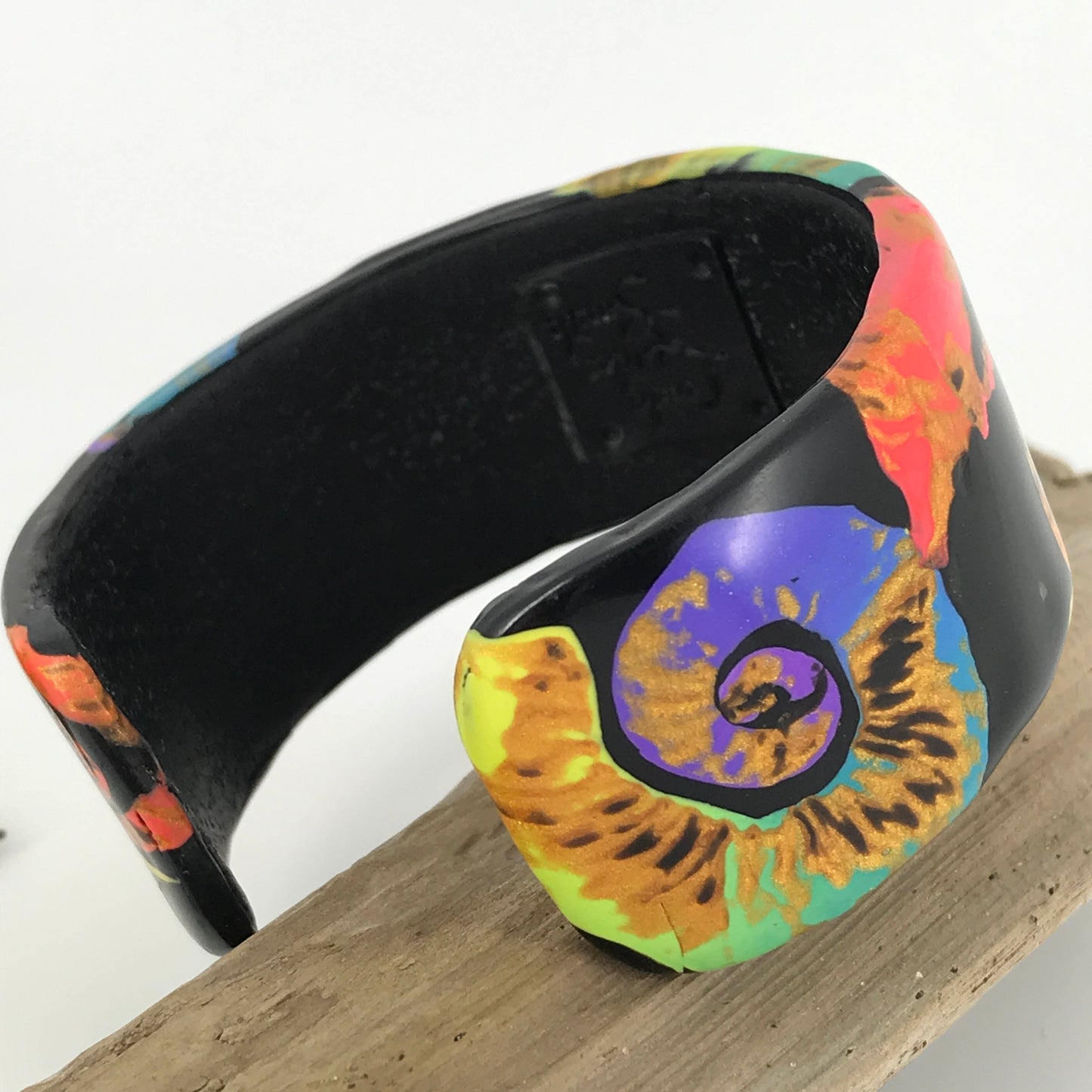 Symphony Of Color Swirls Cuff Bracelet Handmade With Polymer Clay By Linda Stiles Smith Of NatureScapes Studio. Nautilus Pattern Design. Multicolor Bracelet Gift For Women. Back Angled View.