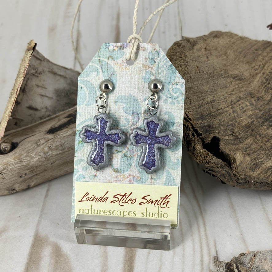 Inner Glow Cross Earrings Cool Tones Collection Handmade with polymer clay by Linda Stiles Smith of NatureScapes Studio. Front View Of Colors: Purple Earrings. Christian Gifts For Women.