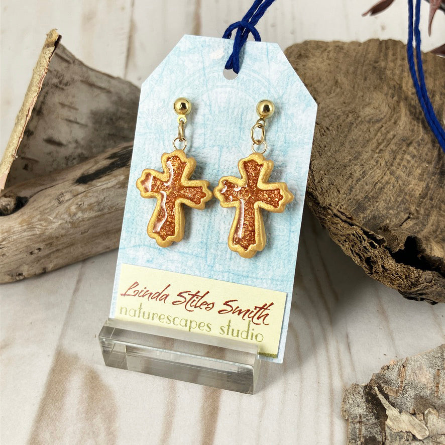 Inner Glow Cross Earrings Warm Hues Collection Handmade with polymer clay by Linda Stiles Smith of NatureScapes Studio. Front view of the color Copper-Gold. Gift ideas for Christian Women.