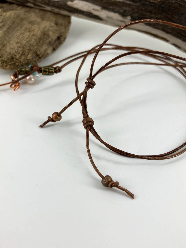 Adjustable leather cord with accent beads on the Rainbow Trout necklace by Linda Stiles Smith.