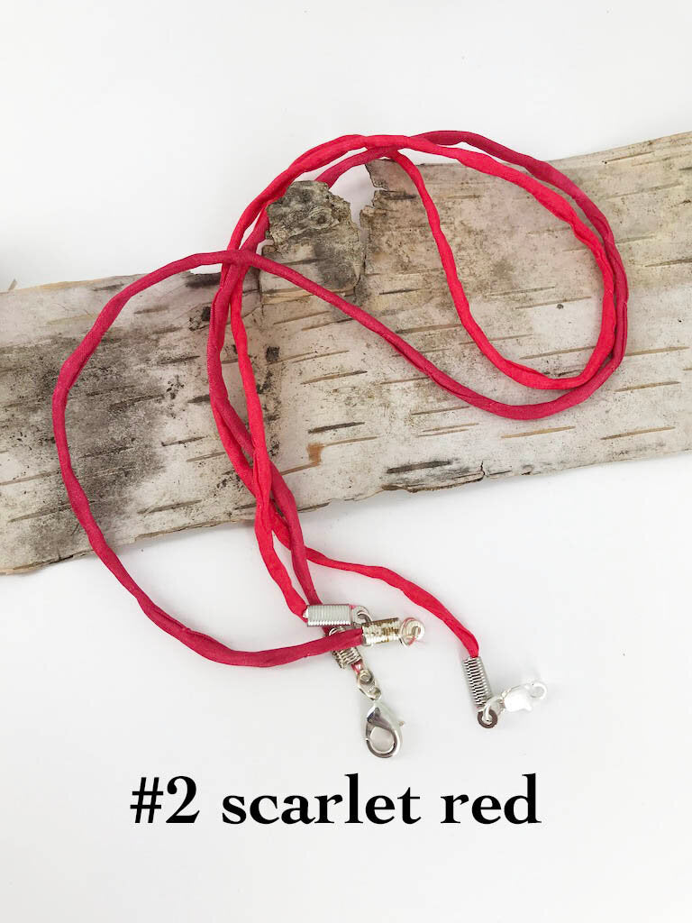 2mm thick scarlet red silk cord finished with silver plated lobster or spring ring clasp, handmade accessory by Linda Stiles Smith of NatureScapes Studio.