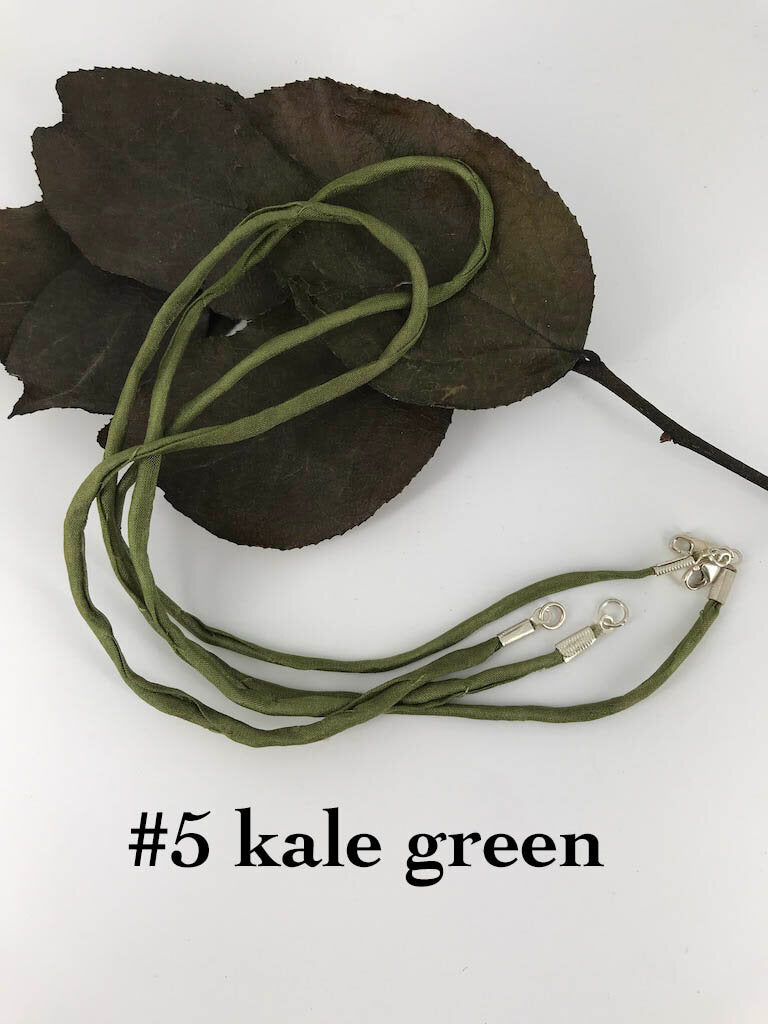 2mm thick kale green silk cord finished with silver plated clasp, handmade by Linda Stiles Smith of NatureScapes Studio.