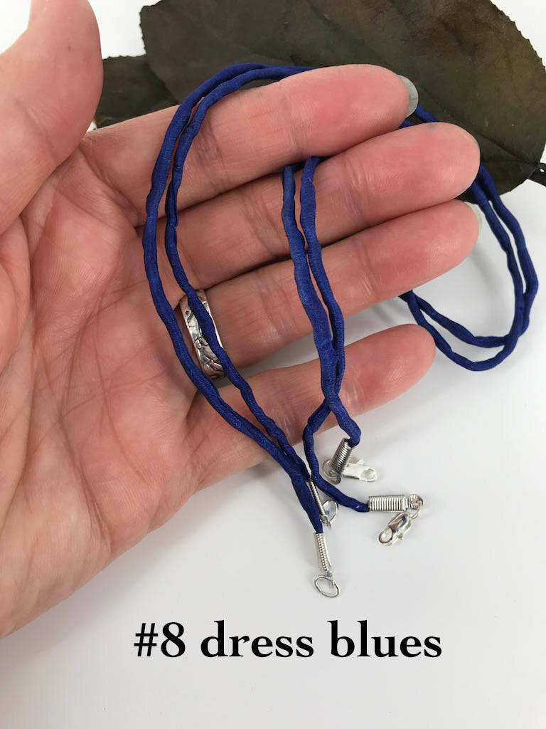 2mm thick dress blue silk cord finished with silver plated clasp, handmade by Linda Stiles Smith of NatureScapes Studio.