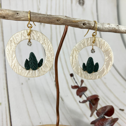 Circled Pine Forest Earrings Handmade With Polymer Clay By Linda Styles Smith Of NatureScapes Studio. Winter Gift For Women. Front View.