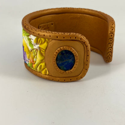 Colorful leaf pattern with lapis gemstone makes a versatile bracelet