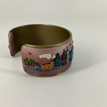 Wearable city landscapes in clay on a cuff bracelt