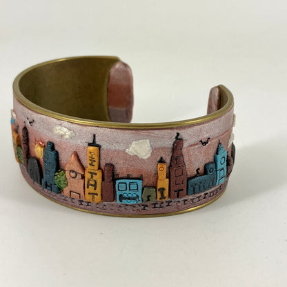 Wearable city landscapes in clay on a cuff bracelt