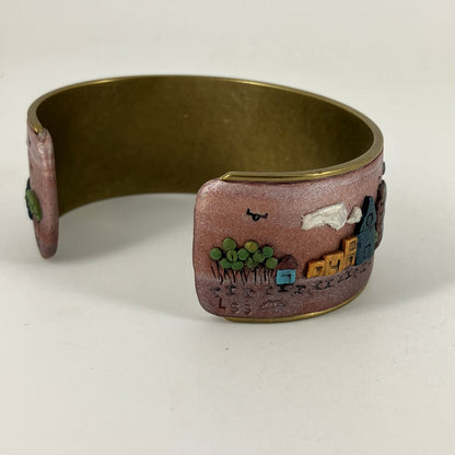 Wearable city landscapes in clay on a cuff bracelt