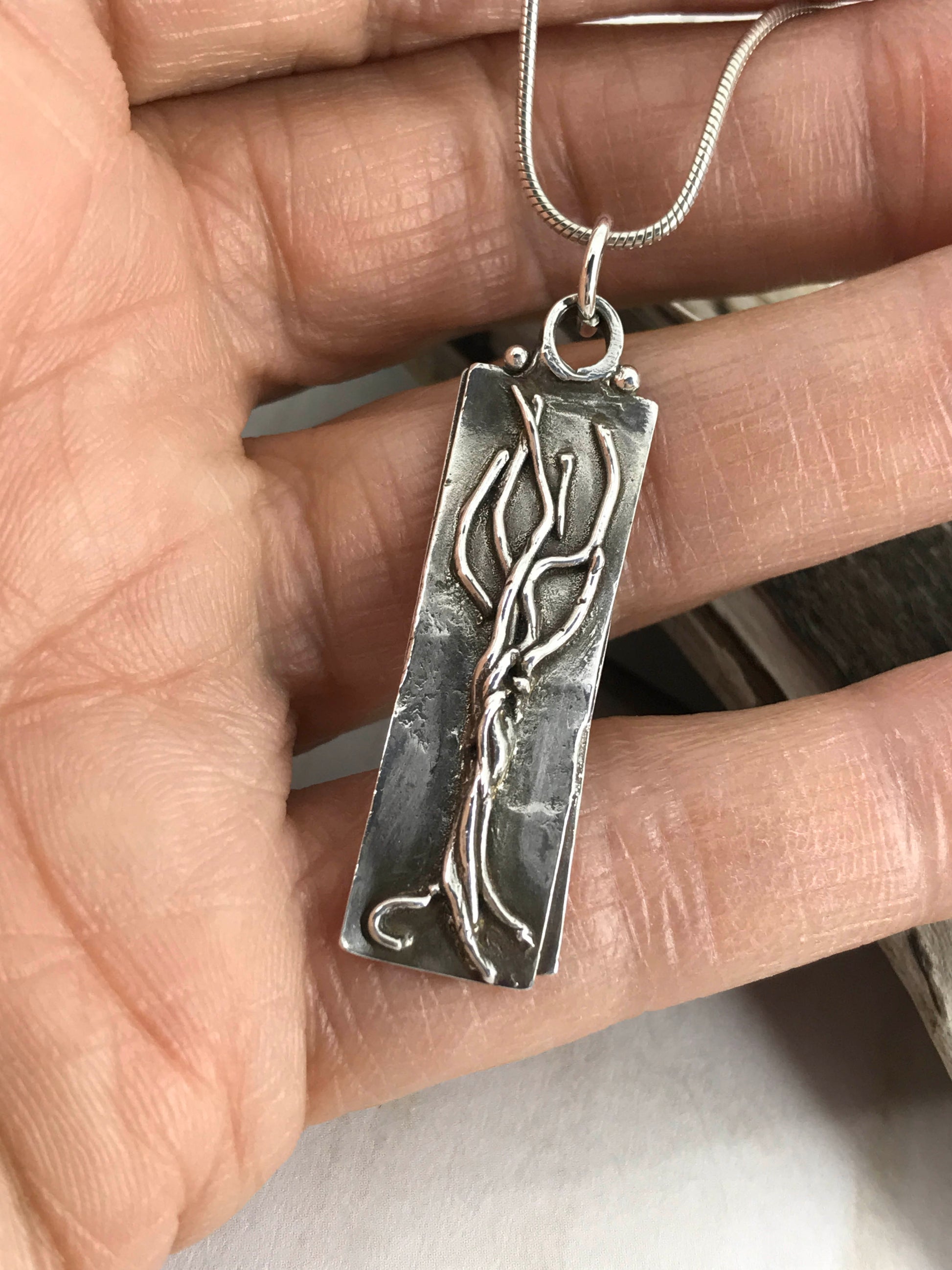 Take Root Pendant. A Unique .999 Fine Silver Message from the “Trees Speak” Series. Handmade By Linda Styles Smith Of NatureScapes Studio. Unique Gift For Women Who Love Nature. Christian Gift Idea. Front View.