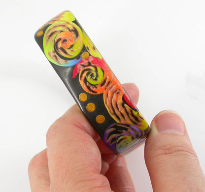 Symphony of Colorful Swirls square Bangle Bracelet handmade with Polymer Clay by Linda Stiles Smith of NatureScapes Studio. side view. Gift ideas for women.
