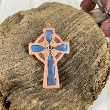 Abide in Me Small Celtic Cross Pendant made from Polymer Clay and Swarovski Crystals by Linda Stiles Smith of NatureScapes Studio. Front View of the blue on copper color. Christian Gifts For Women.