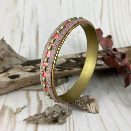 One of the Arm Candy  series this green and coral bangle bracelet strands out with any collection of bangles you have. Handcrafted by Linda Stiles Smith of NatureScapes Studio.