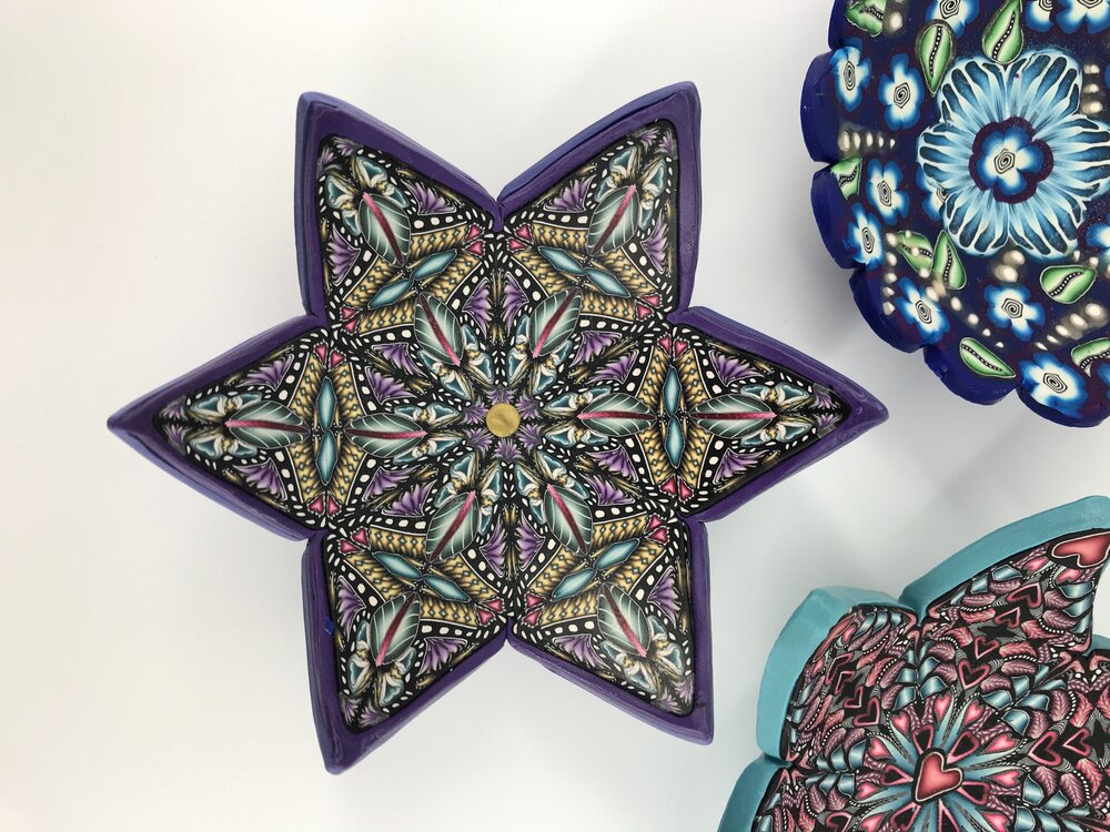 Colorful One-of-a-Kind Trinket Dishes handmade with Polymer Clay by Linda Stiles Smith of NatureScapes Studio. Front view of the purple star design. Gift ideas for women.