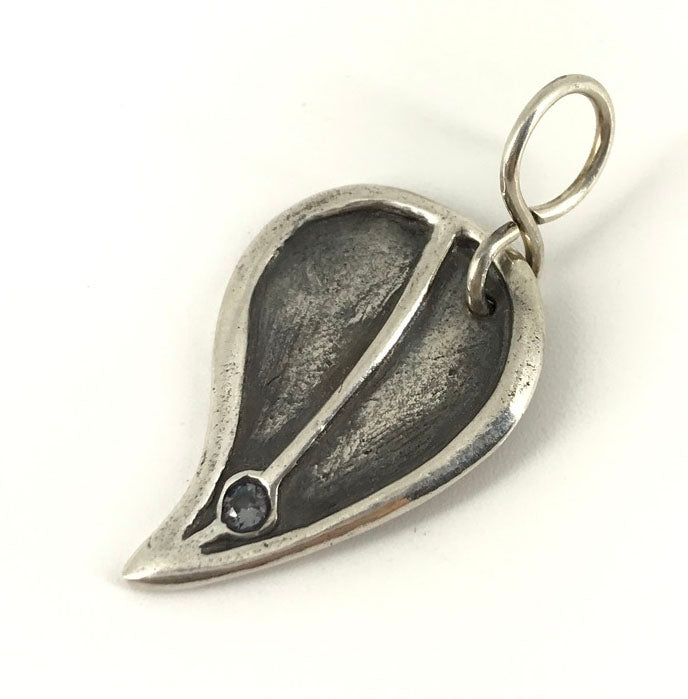 Fine Silver Birthday Leaf Shaped Pendant with birthday month colored stone. Gift for women handmade by Linda Stiles Smith of NatureScapes Studio. Front view, featuring a Faux Alexandrite Cubic Zirconia for the month of June.