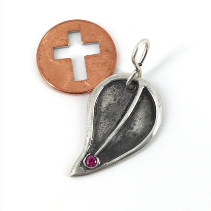 Fine Silver Birthday Leaf Shaped Pendant with birthday month colored stone. Gift for women handmade by Linda Stiles Smith of NatureScapes Studio. Front view, featuring a Faux Ruby Cubic Zirconia for the month of July.