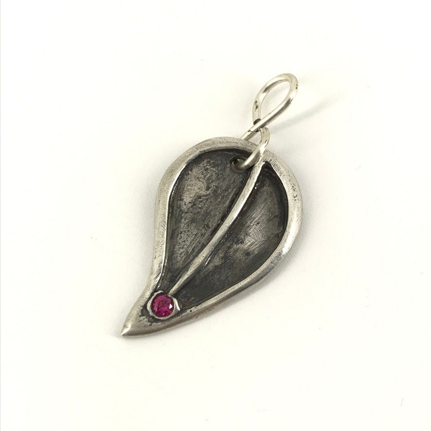 Fine Silver Birthday Leaf Shaped Pendant with birthday month colored stone. Gift for women handmade by Linda Stiles Smith of NatureScapes Studio. Front view, featuring a Faux Ruby Cubic Zirconia for the month of July.