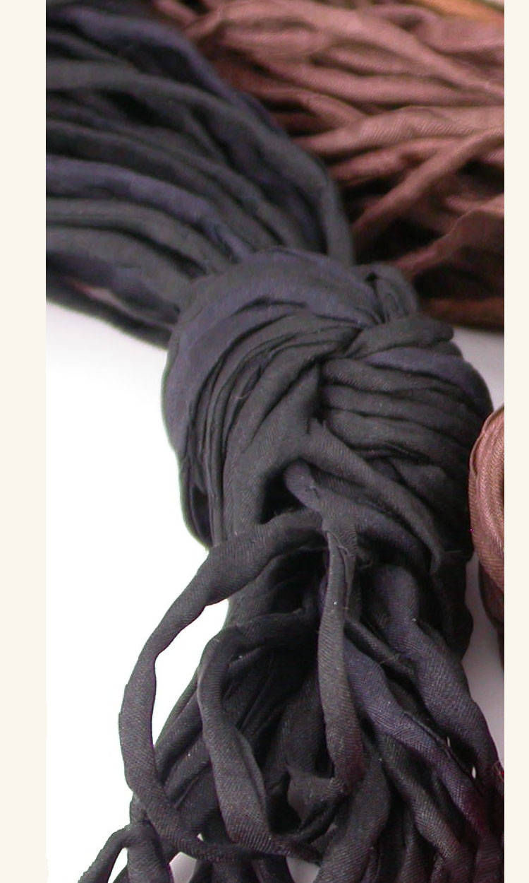 Close up view of the 2mm thick black silk cord by Linda Stiles Smith of NatureScapes Studio.