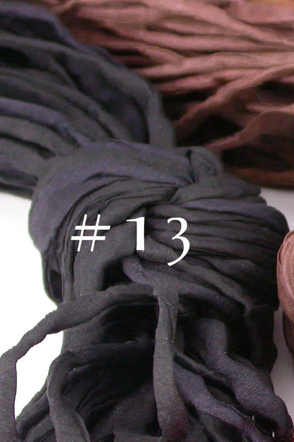 Close up view of the 2mm thick black silk cord by Linda Stiles Smith of NatureScapes Studio.