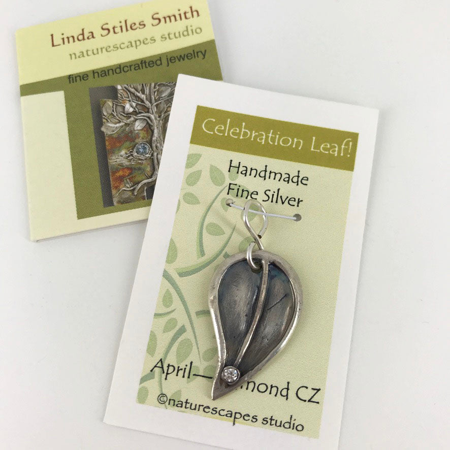 Fine Silver Birthday Leaf Shaped Pendant with birthday month colored stone. Gift for women handmade by Linda Stiles Smith of NatureScapes Studio. Front view, featuring a Faux Diamond Cubic Zirconia.