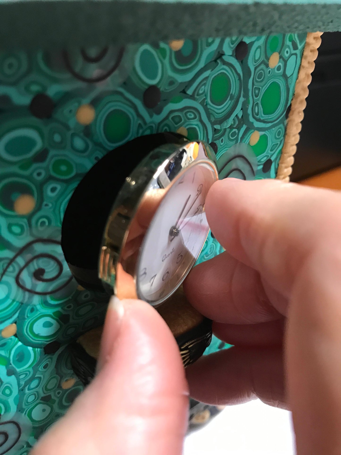 Example on how to open the clock mechanism to access the back of the mechanism on bird house clocks handmade with Polymer Clay by Linda Stiles Smith of NatureScapes Studio. Front view. Gift ideas for women.