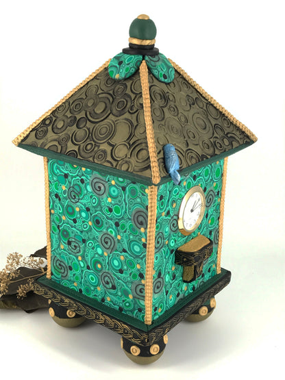 The moment Bird House Bluebird Shelf Clock handmade with Polymer Clay by Linda Stiles Smith of NatureScapes Studio. Side-Front view. Gift ideas for women.