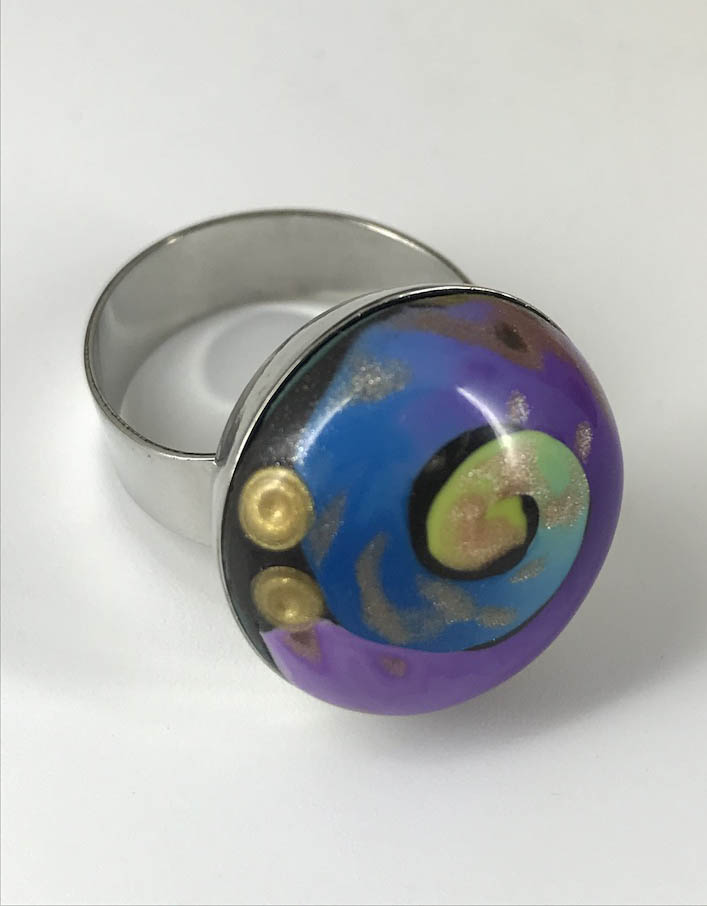 Swirls of Color Adjustable Rings handmade with Polymer Clay by Linda Stiles Smith of NatureScapes Studio. Blue Purple Swirl Silver Ring view. Gift ideas for women.