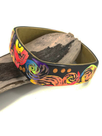 Symphony of Colorful Swirls Bangle Bracelet handmade with Polymer Clay by Linda Stiles Smith of NatureScapes Studio. Front view. Gift ideas for women.