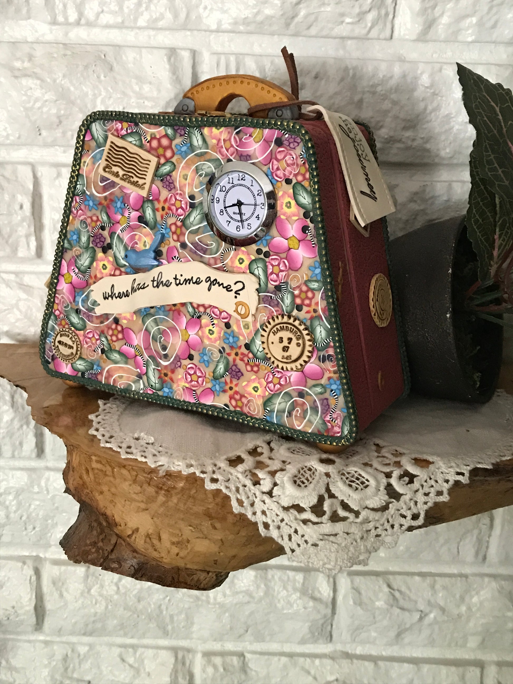 Enjoy the journey Travel Time! Desk Clock handmade with Polymer Clay by Linda Stiles Smith of NatureScapes Studio. Front view on a shelf. Great gift idea for Women.