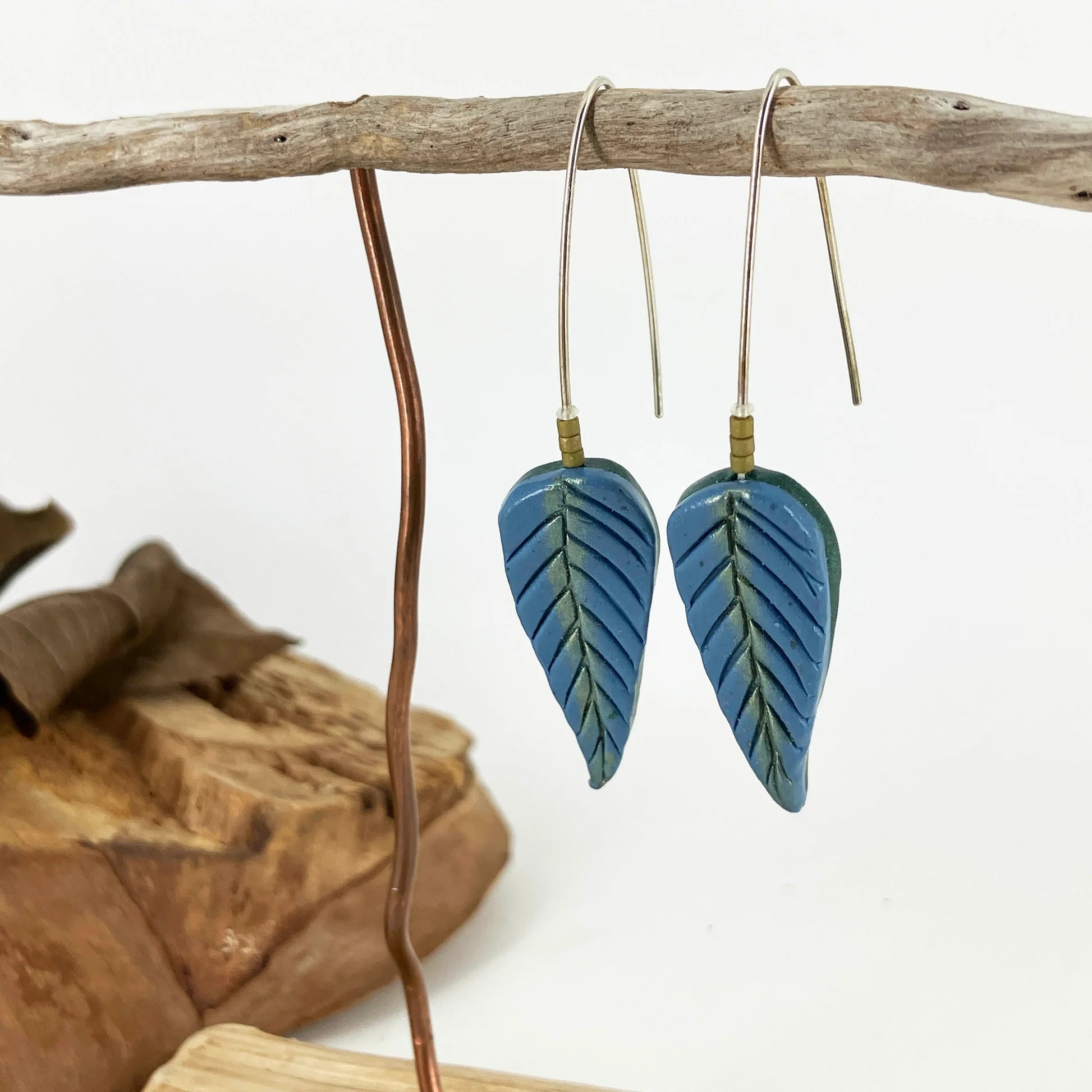Stylish Long Hooks Earrings with Blue Leaf Drop